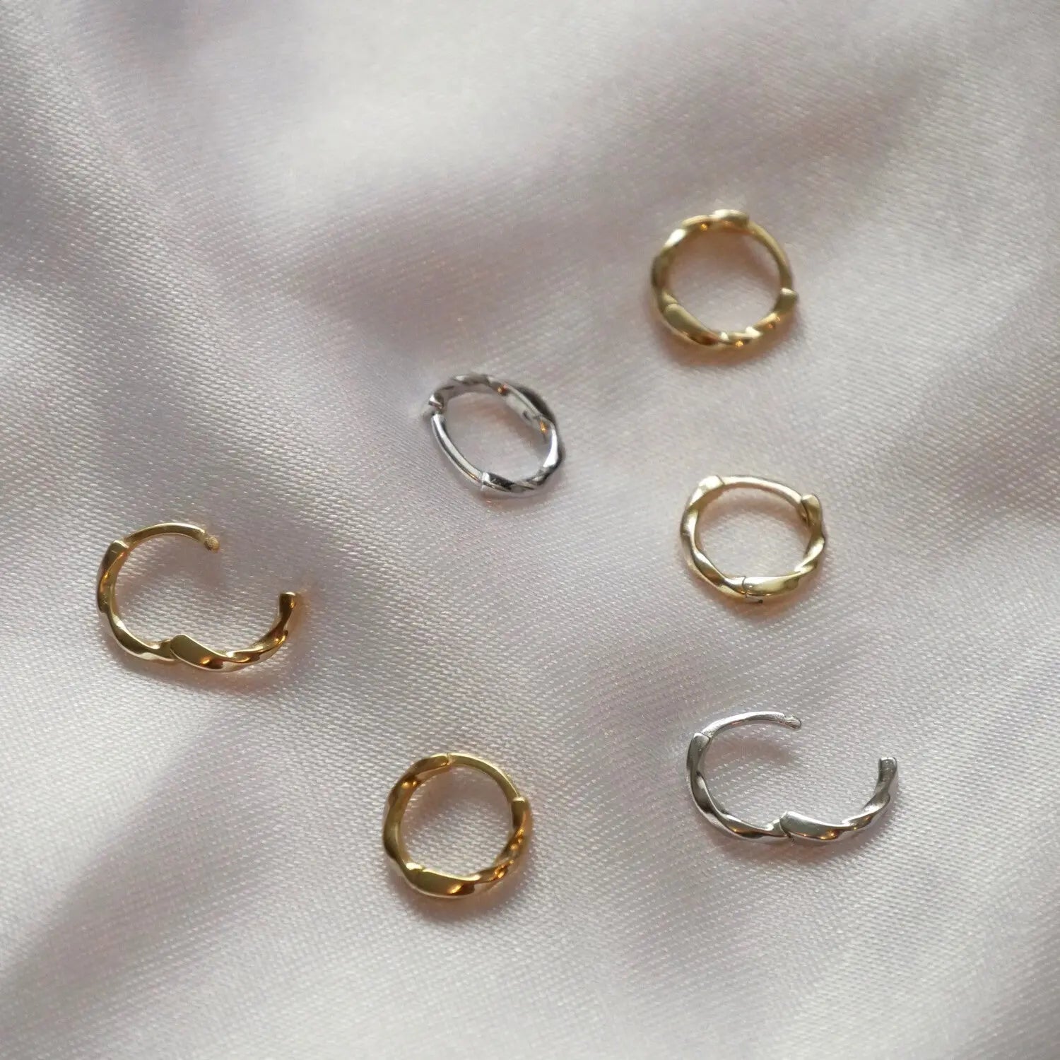 Twist Ear huggies silver/gold CharityGoodz